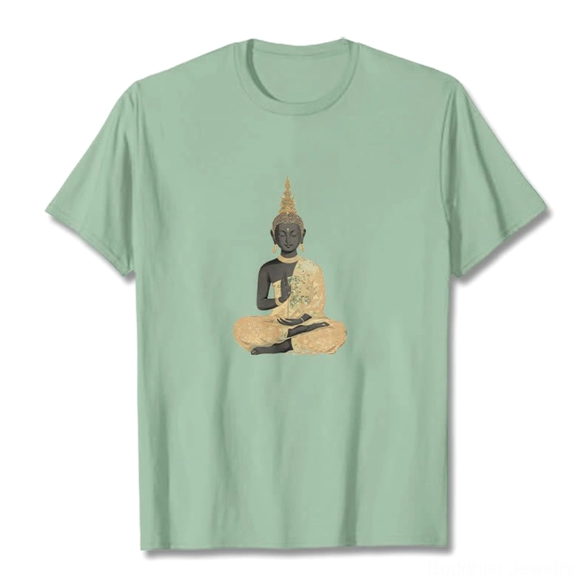 Pale green meditating Buddha t-shirt front flat lay spiritual energy design