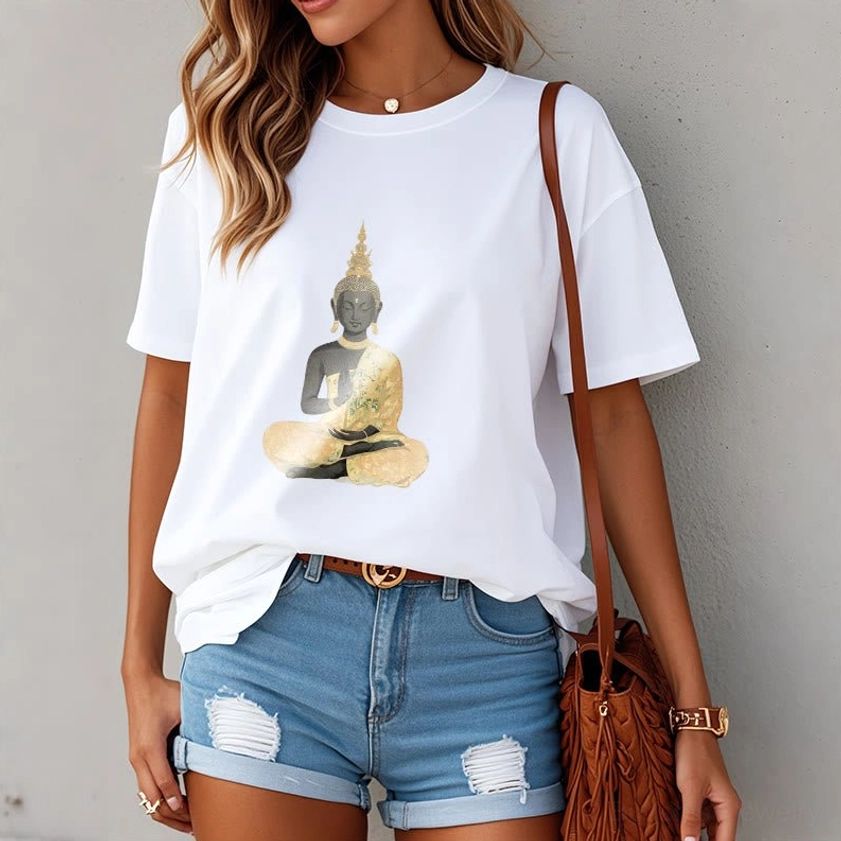 Female model wearing white meditating Buddha t-shirt paired with denim accessories