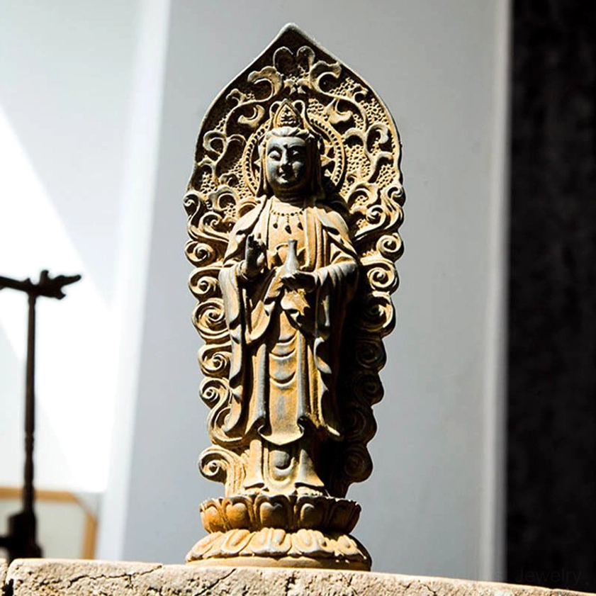 Three-dimensional Amitabha Buddha trinity statue showing depth and dimensional carving of Buddhist iconography in iron powder resin material
