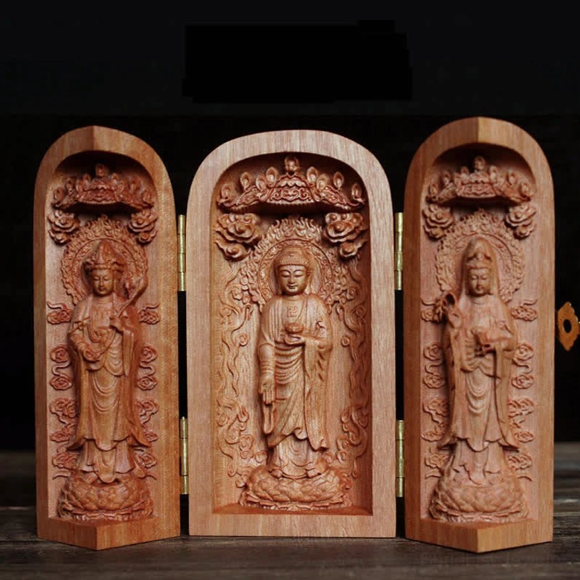 Tri-fold Buddhist altar shrine with three unique deity figures and gilded brass hinges displayed open