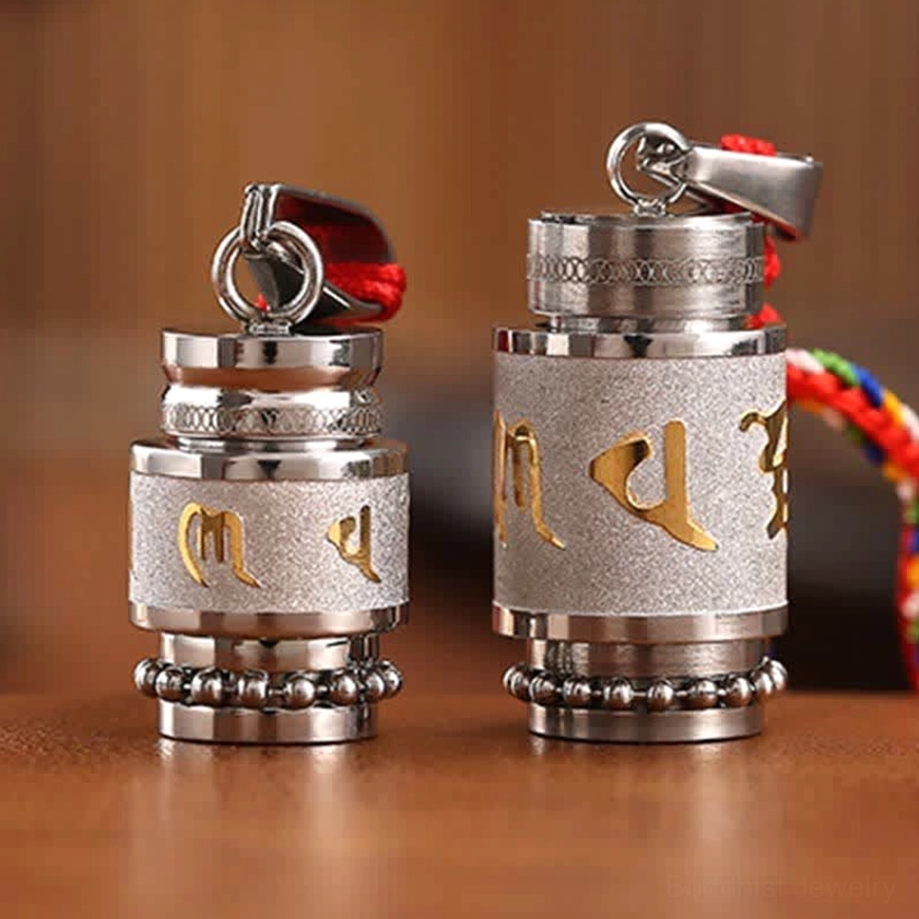 Buddhist wisdom amulet pendant large size with polished silver and gold finish options detail