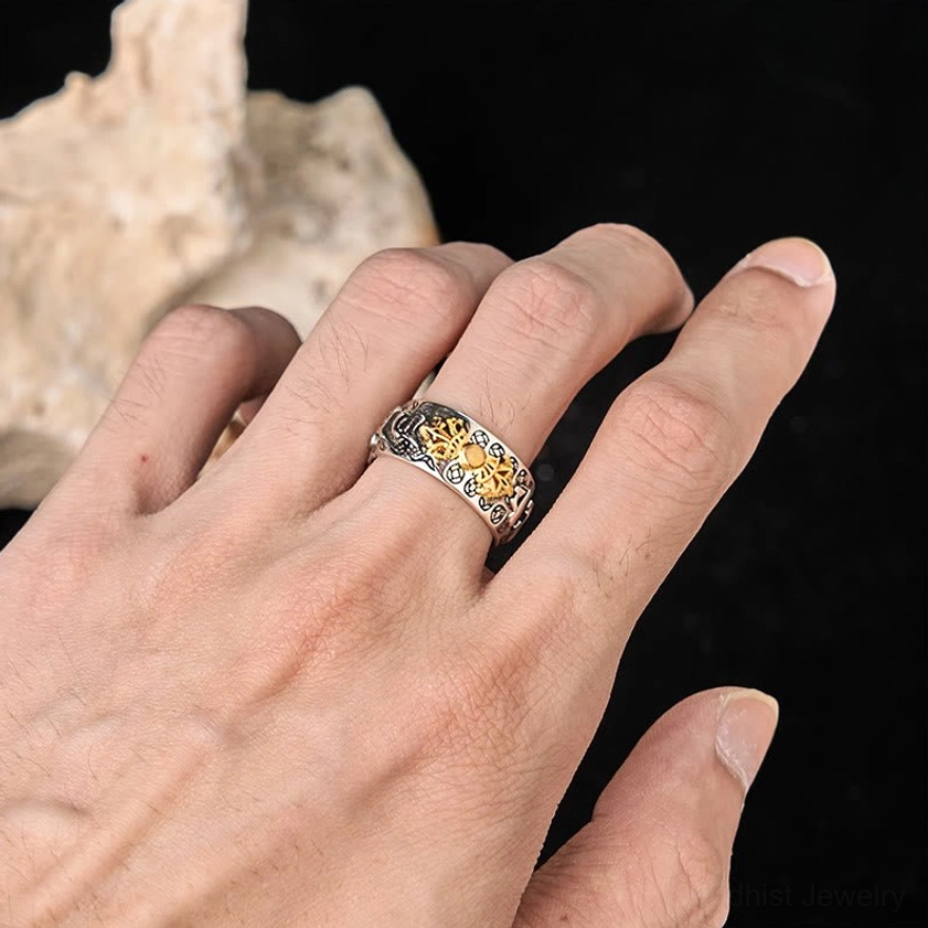 Buddhist balance ring copper plated silver adjustable sizing showing spiritual mantra text and protective vajra emblem