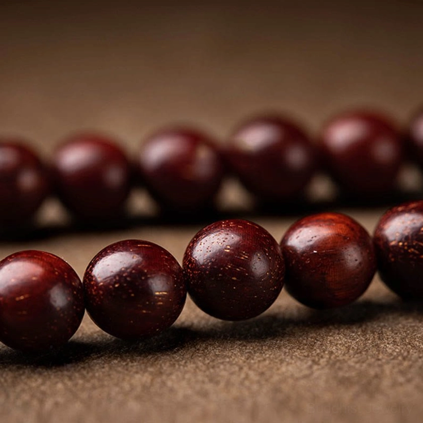 Beaded Buddhist car hanging accessory set with Chinese character blessing plaques, red agate beads, and dark sandalwood beads close-up