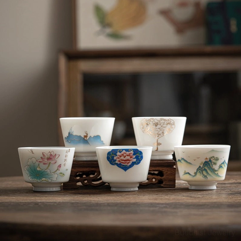 Handcrafted Buddhist porcelain kung fu tea cup with traditional bird and nature landscape painting for meditation