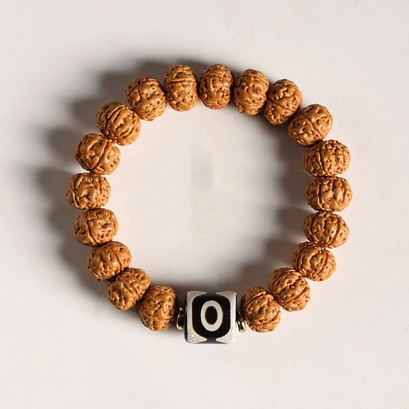 Authentic Buddhist bodhi seed bracelet with three-eye Dzi bead amulet and carved Buddha hand charm