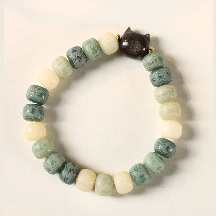 Buddhist bodhi seed bracelet with protective black obsidian cat head, spiritual meditation jewelry for enlightenment