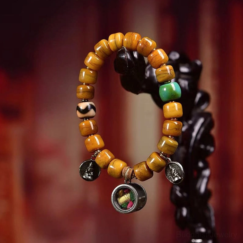 Bone bead bracelet with dzi stone and fox charm for Buddhist meditation and spiritual wellness