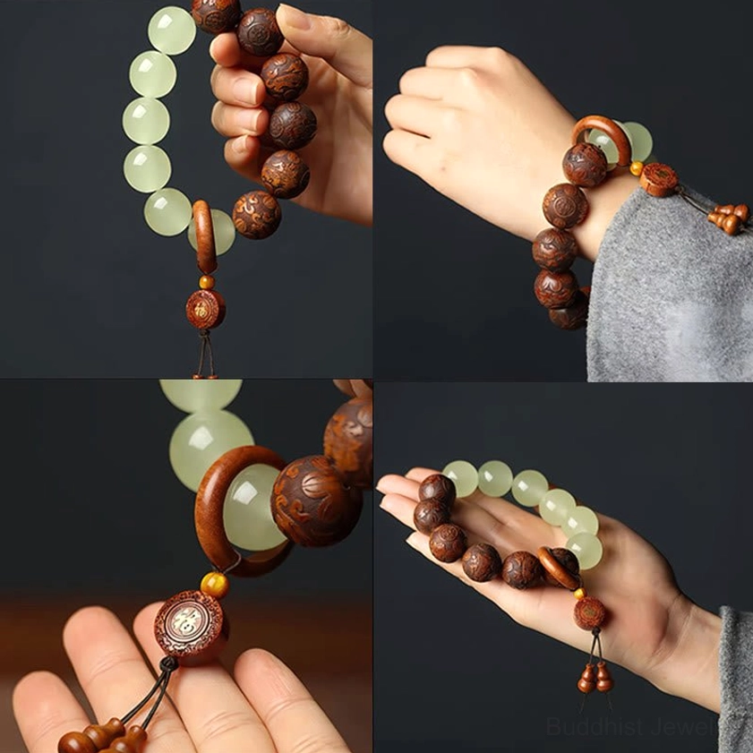 Buddhist bracelet display featuring carved wooden beads and Fu character charm pendant for wealth and blessings