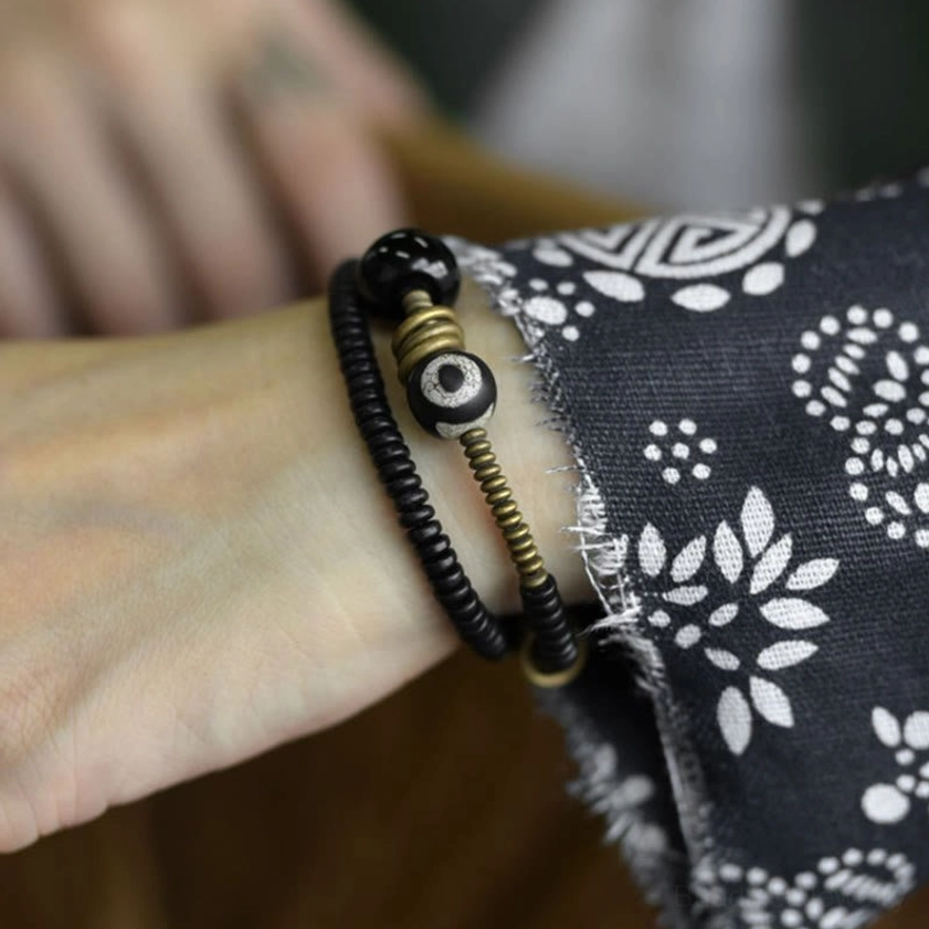 Buddhist jewelry handmade craftsmanship artisan assembly process close-up