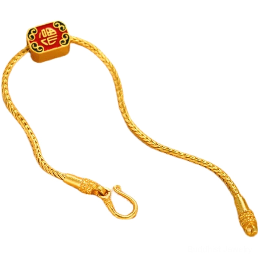 Buddhist charm bracelet showing secure push-lock metal clasp on twisted gold chain