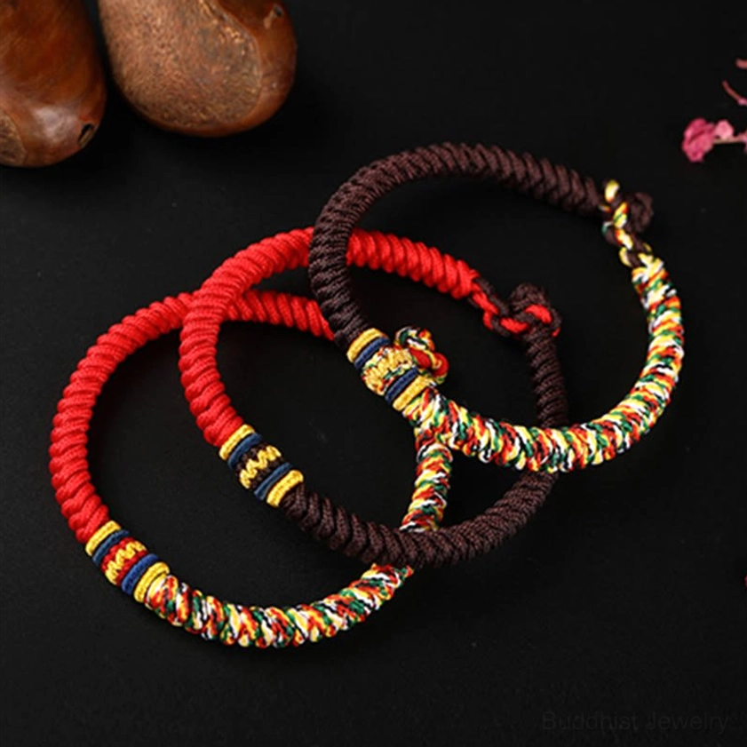 Set of handmade Buddhist string bracelets featuring multiple color variations including red brown and multicolored options with King Kong Knot design