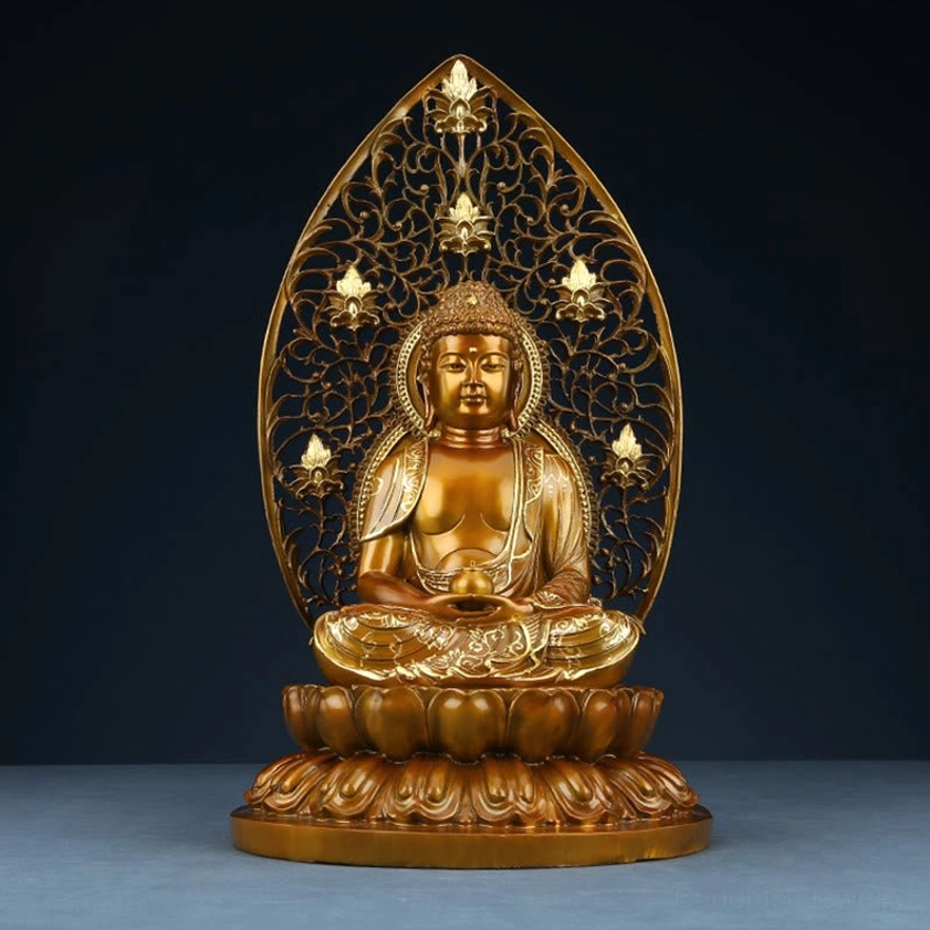 Buddhist Buddha statue close-up - Detailed facial expression and hand position in polished handcrafted copper