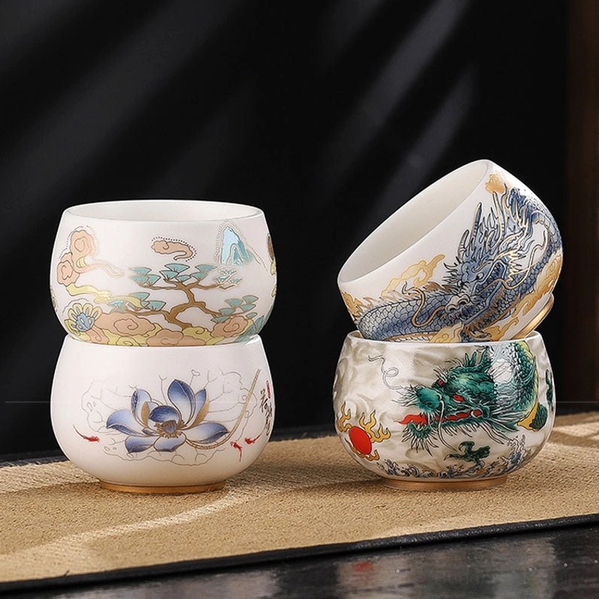 Dragon rising all over the world ceramic tea cup featuring powerful Buddhist prosperity symbolism