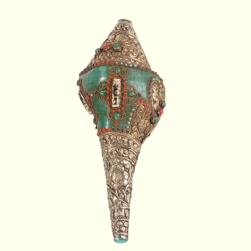 Complete Tibetan Buddhist Shankha conch ornament front overhead view with symmetrical decorative inlay and full silver carved shell design