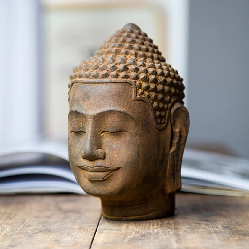 Buddhist contemplation head sculpture showcasing intricate hand-sculptured details and authentic rust-cast finish