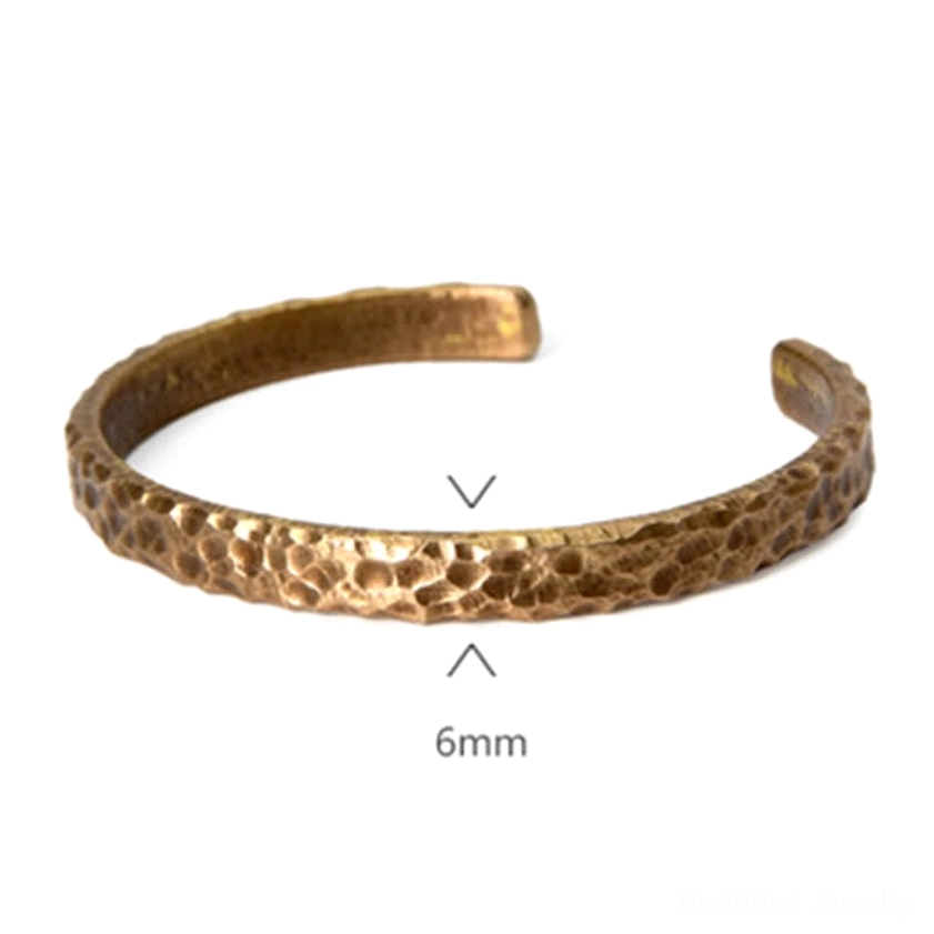 Buddhist-inspired copper cuff bracelet for healing, balance, and chakra alignment spiritual wellness practice
