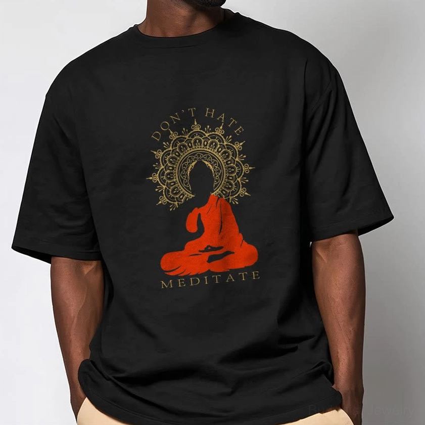 Male model wearing black Don't Hate Meditate graphic t-shirt casual half-body view