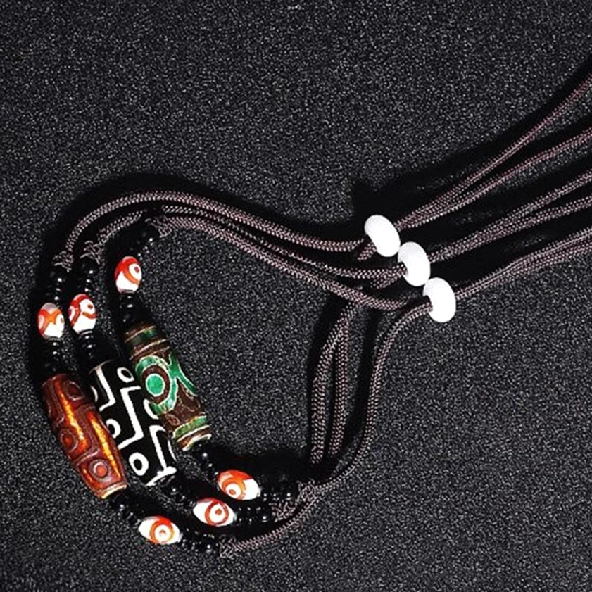 Authentic Buddhist dzi bead protection necklace with natural agate stone, handmade braided cord, and adjustable length