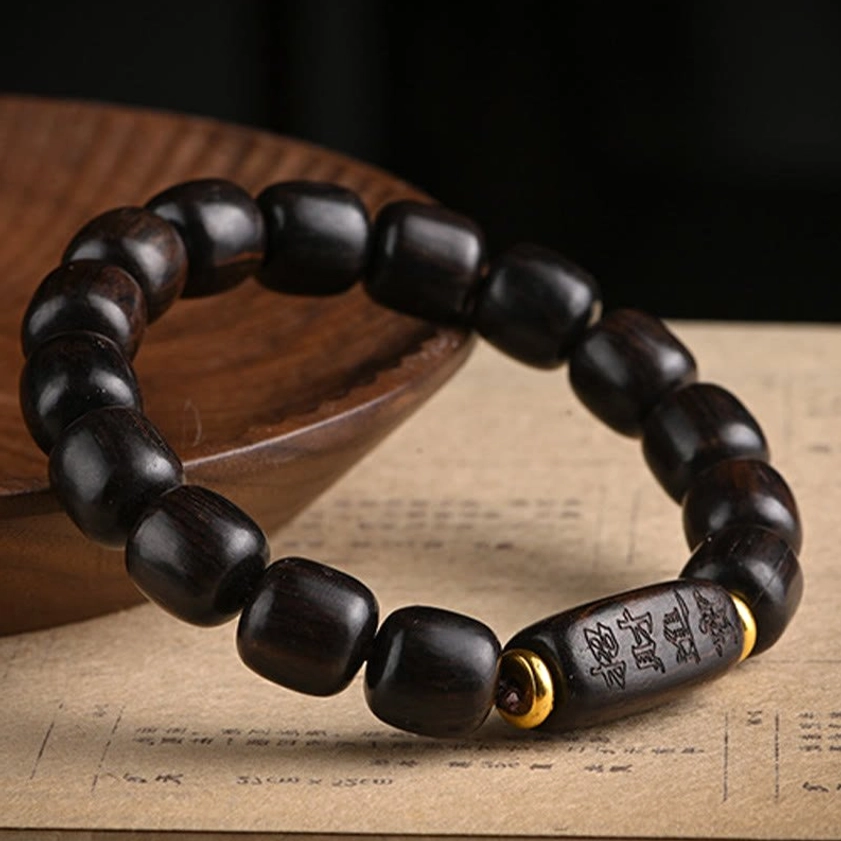 Ebony wood Buddhist barrel bead bracelet for wealth and prosperity spiritual practice