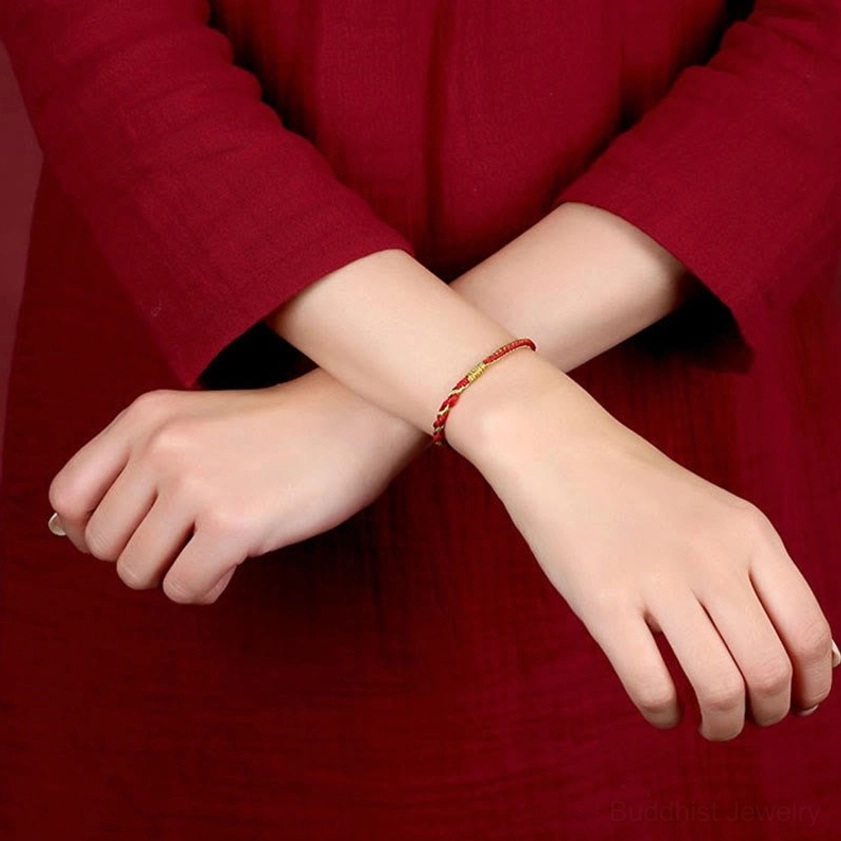 Buddhist red string bracelet with natural materials and eco-friendly sustainable production