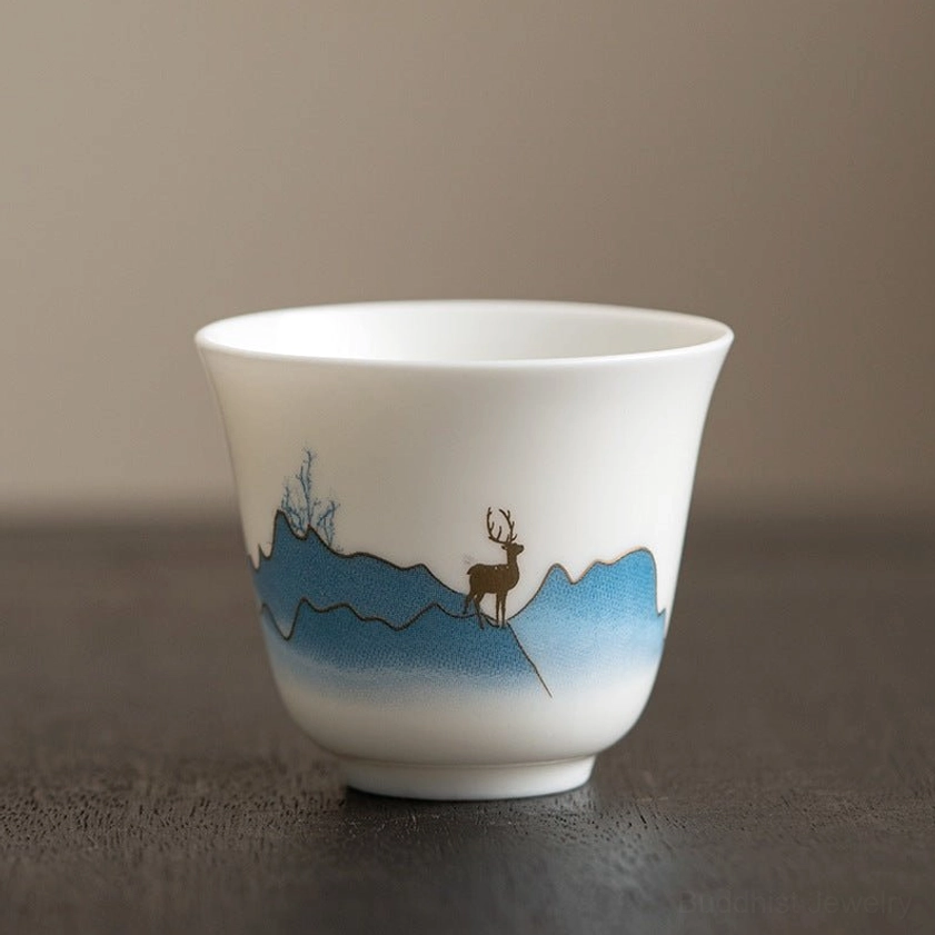 Authentic Buddhist ceramic kung fu tea cup featuring graceful hand-painted elk design representing mindfulness and spiritual awareness