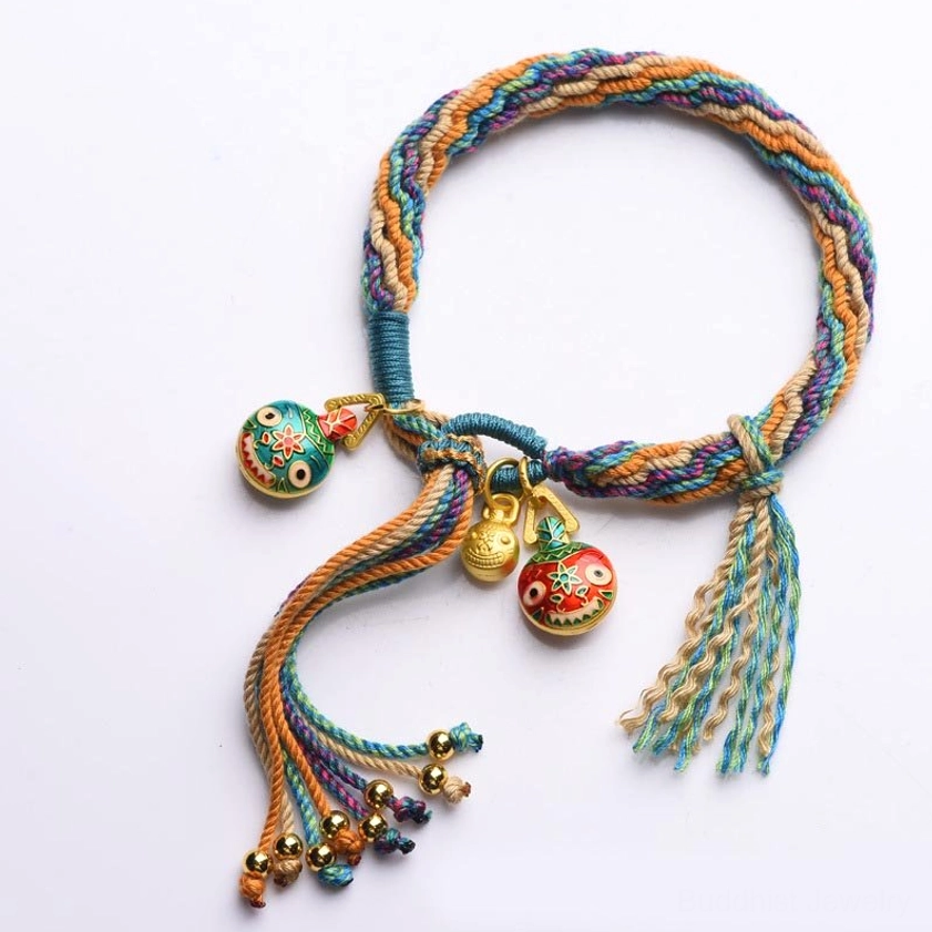 Buddhist family fortune protection bracelet with multicolor braided threading and gold-toned enamel swallowing beast guardians
