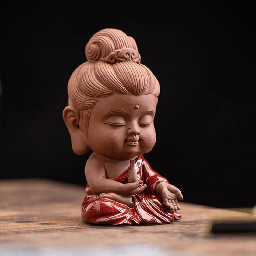 Buddhist ceramic figurine set display showing authentic hand-painted details artisan craftsmanship and spiritual significance of three sacred beings
