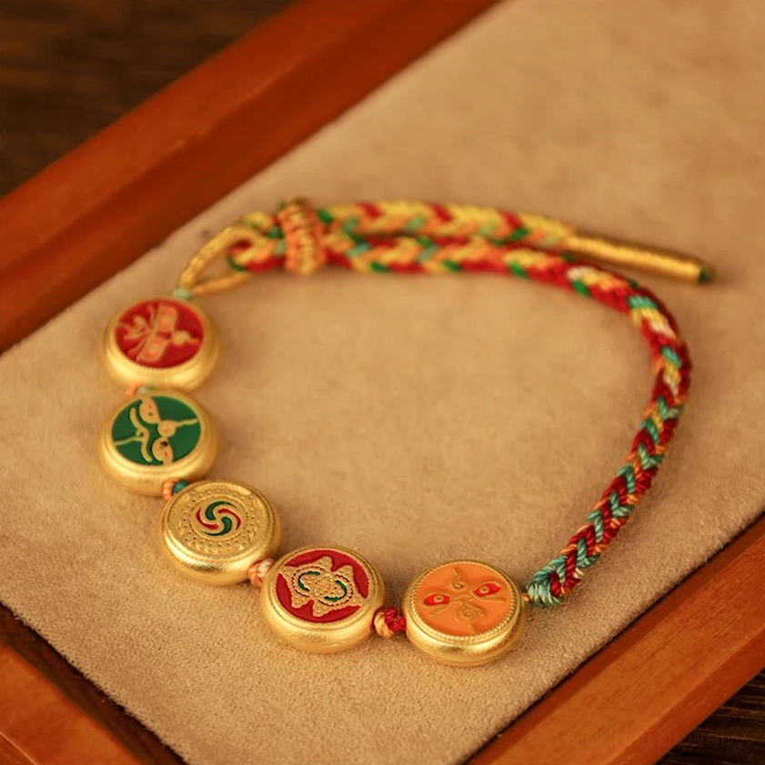 Buddhist luck bracelet featuring five wealth deities in enamel with premium braided rope and copper-gold charms