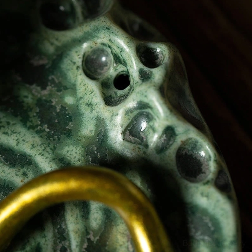 Buddhist frog ceramic incense burner with lotus leaf design, handcrafted meditation holder angle view