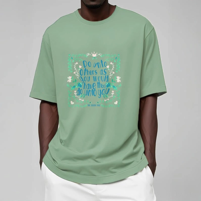 Male model wearing sage green Buddhist compassion t-shirt with golden rule spiritual graphic design front view