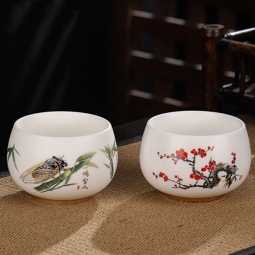Bamboo cicada symbol ceramic tea cup embodying transformation, integrity, and spiritual growth