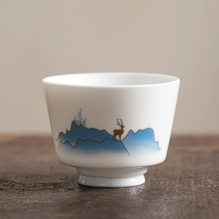 Buddhist handmade porcelain tea cup featuring graceful hand-painted elk design representing spiritual grace and awareness