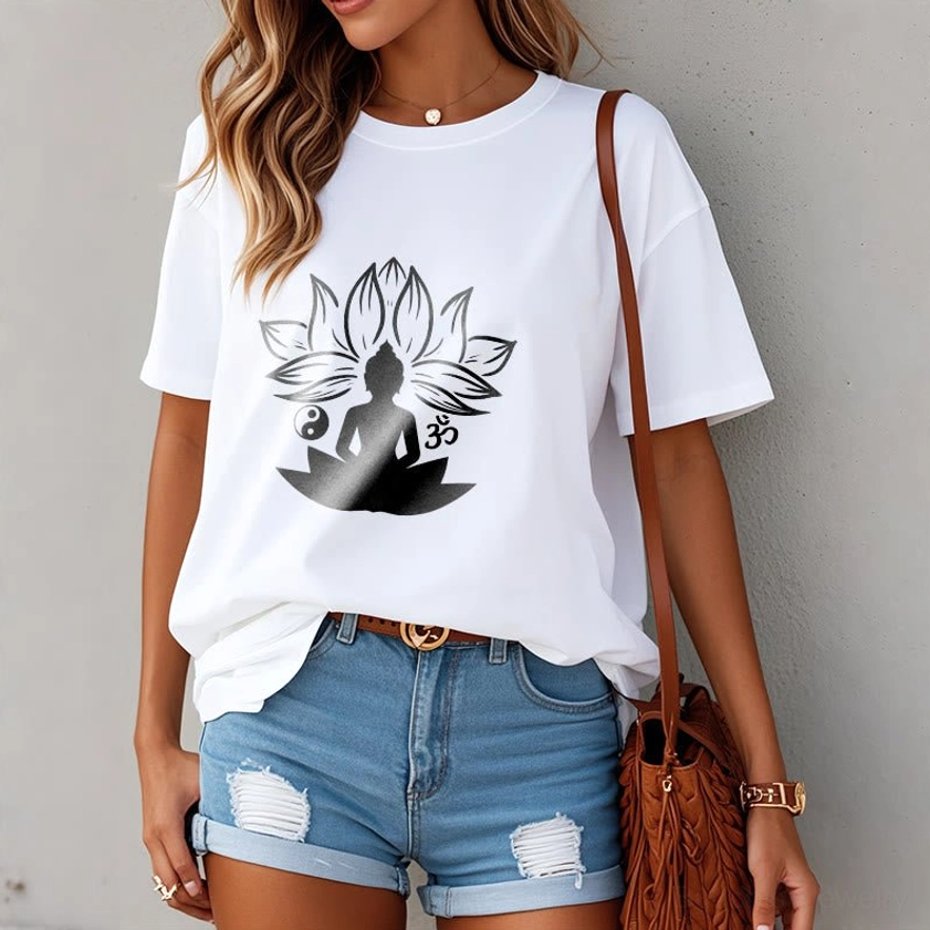Woman wearing Buddhist T-shirt with spiritual lotus design, styled with denim and casual accessories