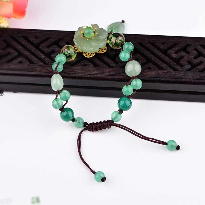 Green jade bracelet for prosperity and good fortune, Buddhist spiritual jewelry collection display
