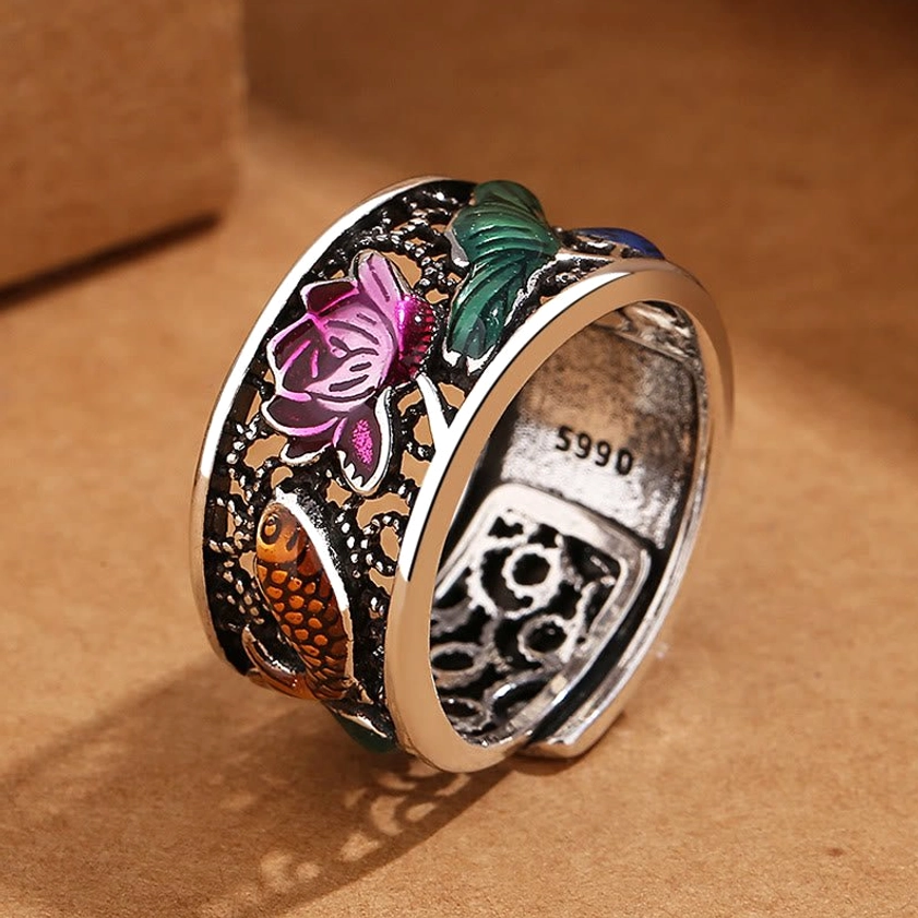Back side view of adjustable open-band Heart Sutra koi fish ring showing inner S990 stamp and intricate hollow carved Buddhist scripture engraving