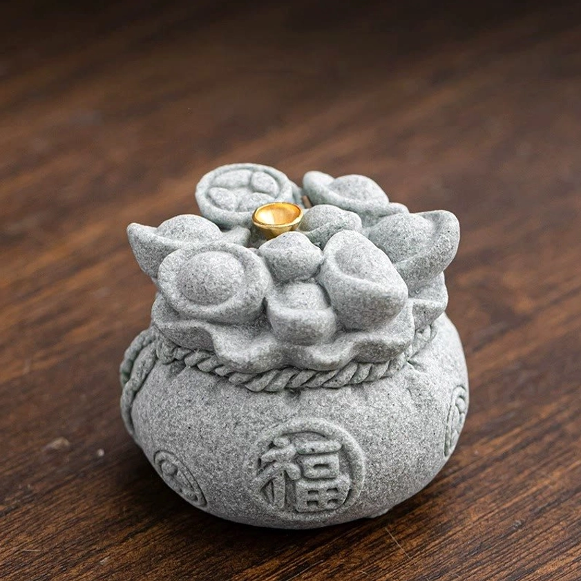 Complete view of natural sandstone Buddhist incense burner showing all decorative elements and design
