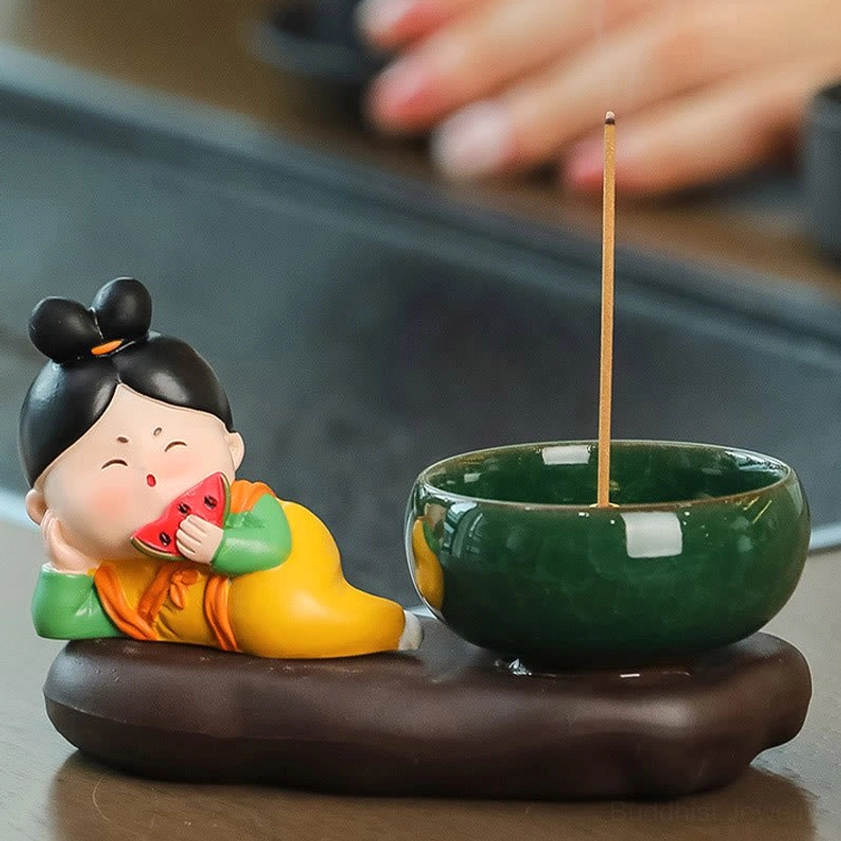 Buddhist ceramic incense burner with watermelon style lady figurine, artistic handcrafted design for meditation and spiritual practice