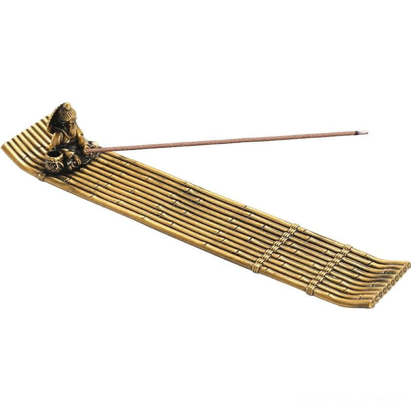 Three-quarter side angle of Buddhist incense burner with lit incense smoke rising from long bamboo strip base, antique brass tone