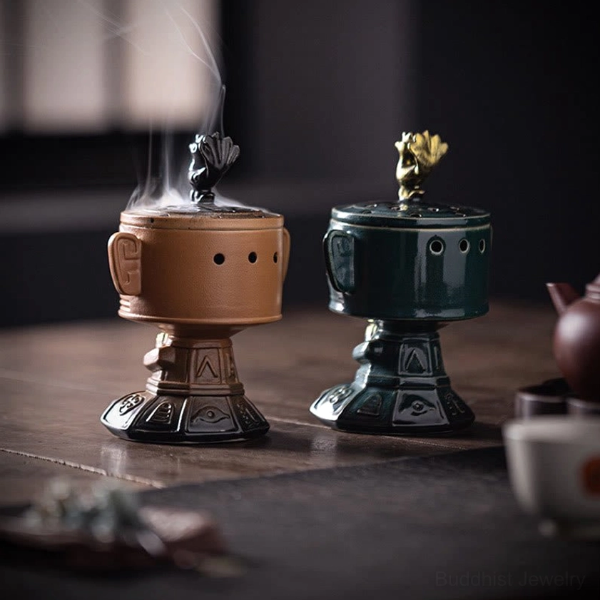 Buddhist ceramic incense holder in office workspace, creating calm focused environment with spiritual elegance