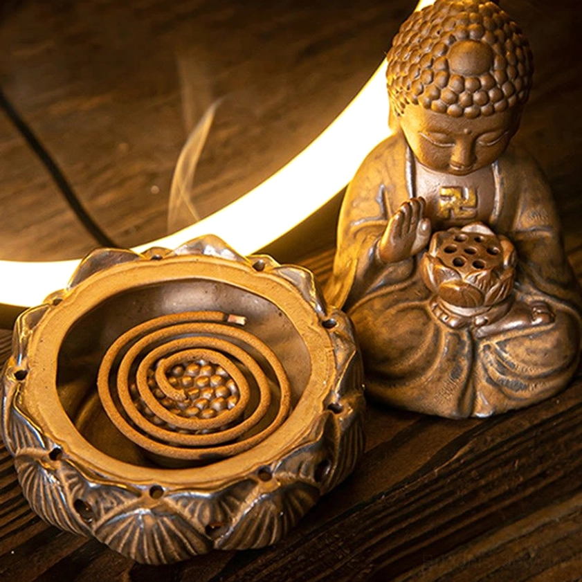 Both color variants of Buddhist ceramic incense burners - red and brown Buddha designs with LED backlight