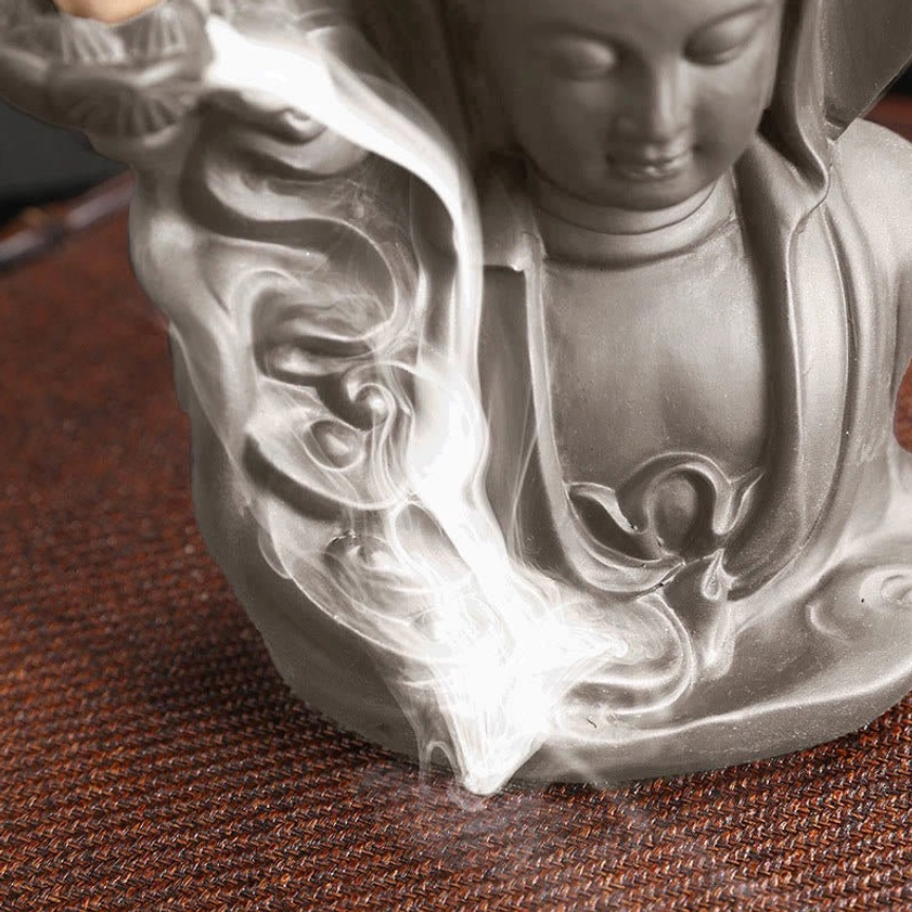Avalokitesvara Buddha incense burner left side view with backflow smoke and robe carvings