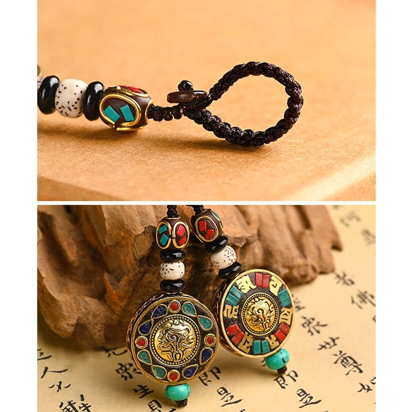 Buddhist keychain beaded strap with black braided rope and mixed metal stone beads detail