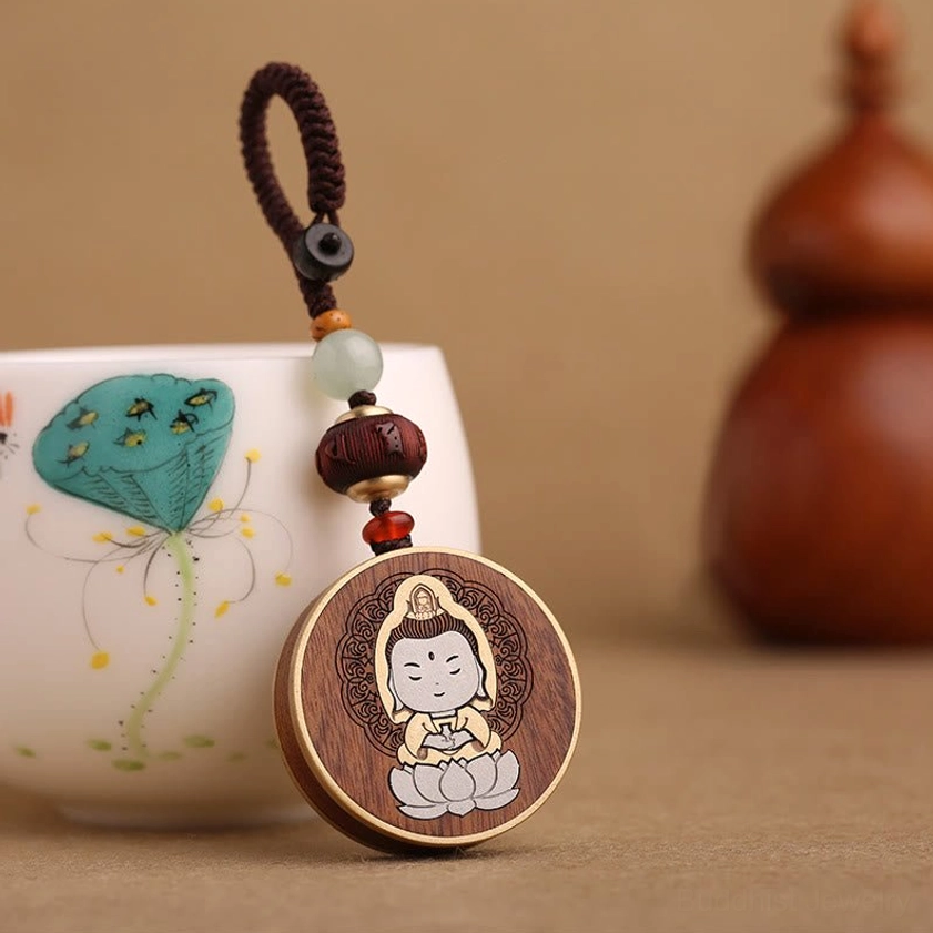 Buddhist keychain collection showing various wood materials and design styles