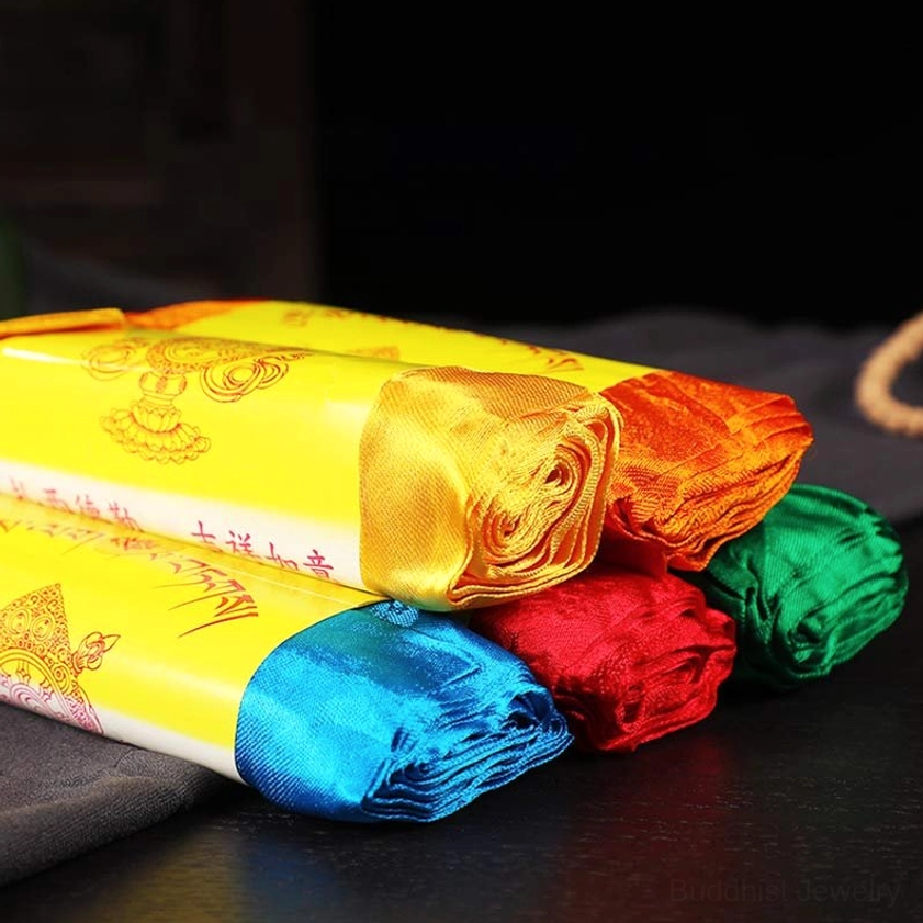 Five-color Buddhist ceremonial khata scarf rolled presentation for gifting and spiritual ceremonies