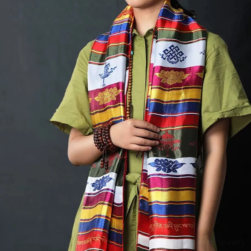 Multicolored Buddhist Khata scarf featuring endless knot and golden lotus embroidery with vibrant striped design, displayed front view