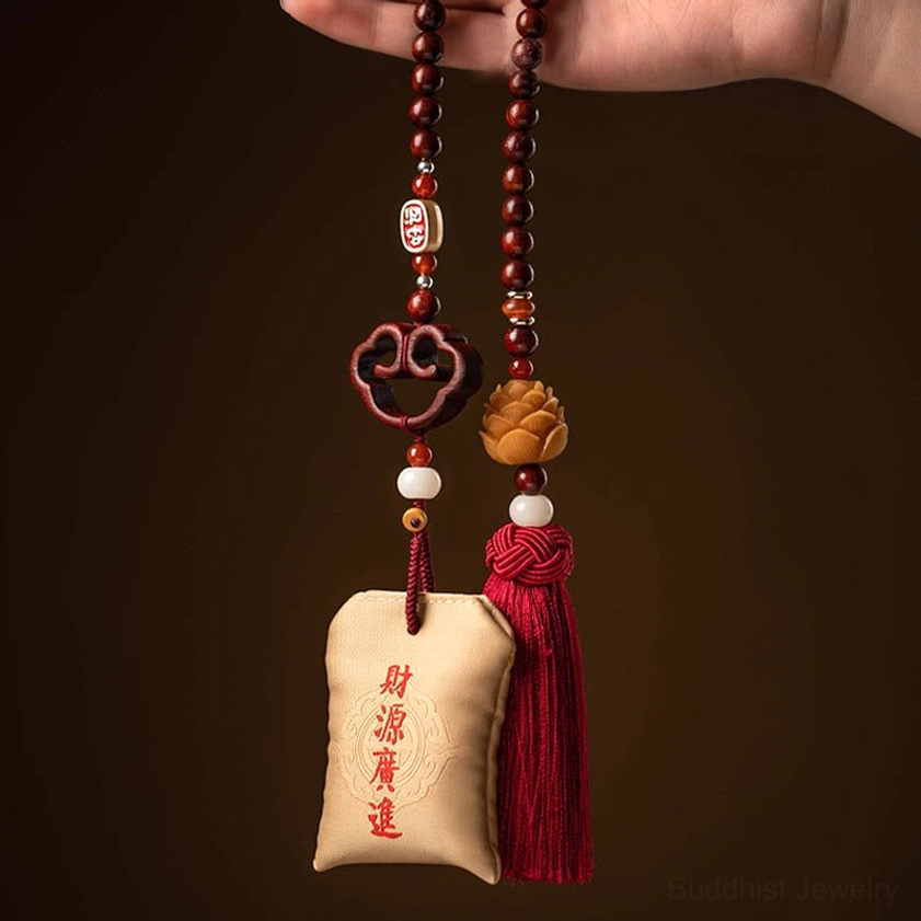 Complete Buddhist lotus car hanging sachet set showing embroidered design, protective cinnabar, sandalwood beads, and tassel ornament detail
