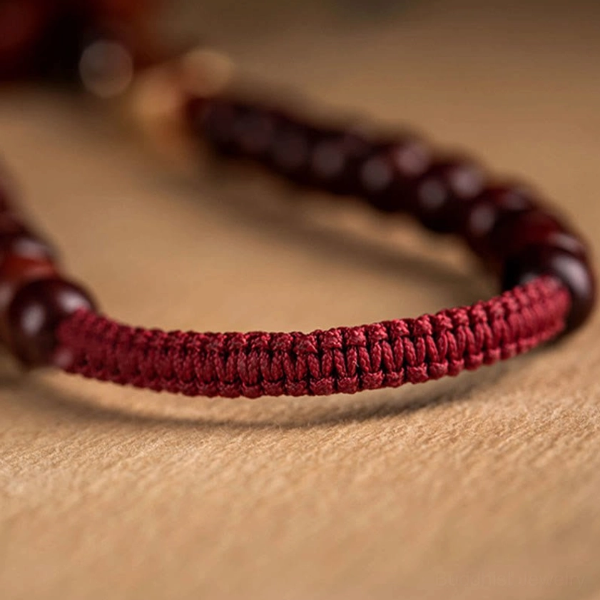 Buddhist lotus car sachet with life-long peace blessing, sandalwood beads, red agate accent, and embroidered spiritual symbols