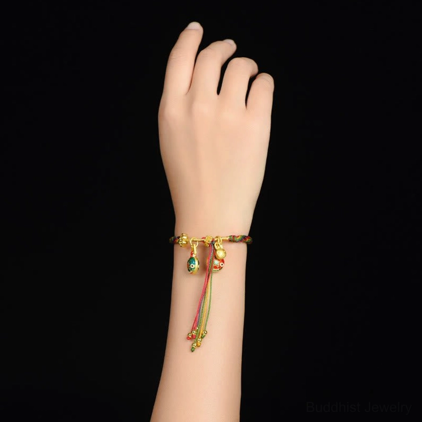 Buddhist protection bracelet worn on wrist showing real-world wearing effect and sizing of the luck cord