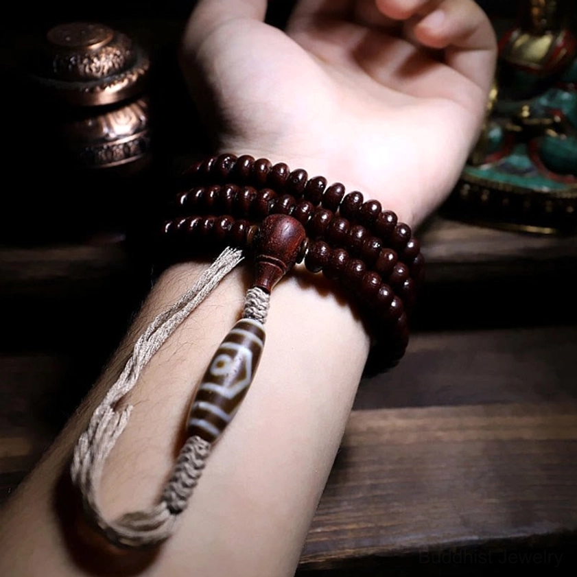 Buddhist mala bracelet 108 beads featuring purple bodhi seeds and protective amulets
