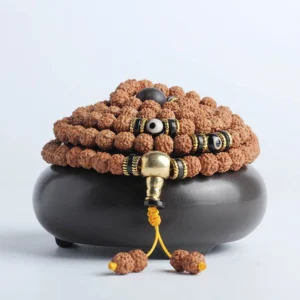 108 Bead Buddhist Prayer Mala Bracelet with Rudraksha and Bodhi Seeds on Black Display Holder